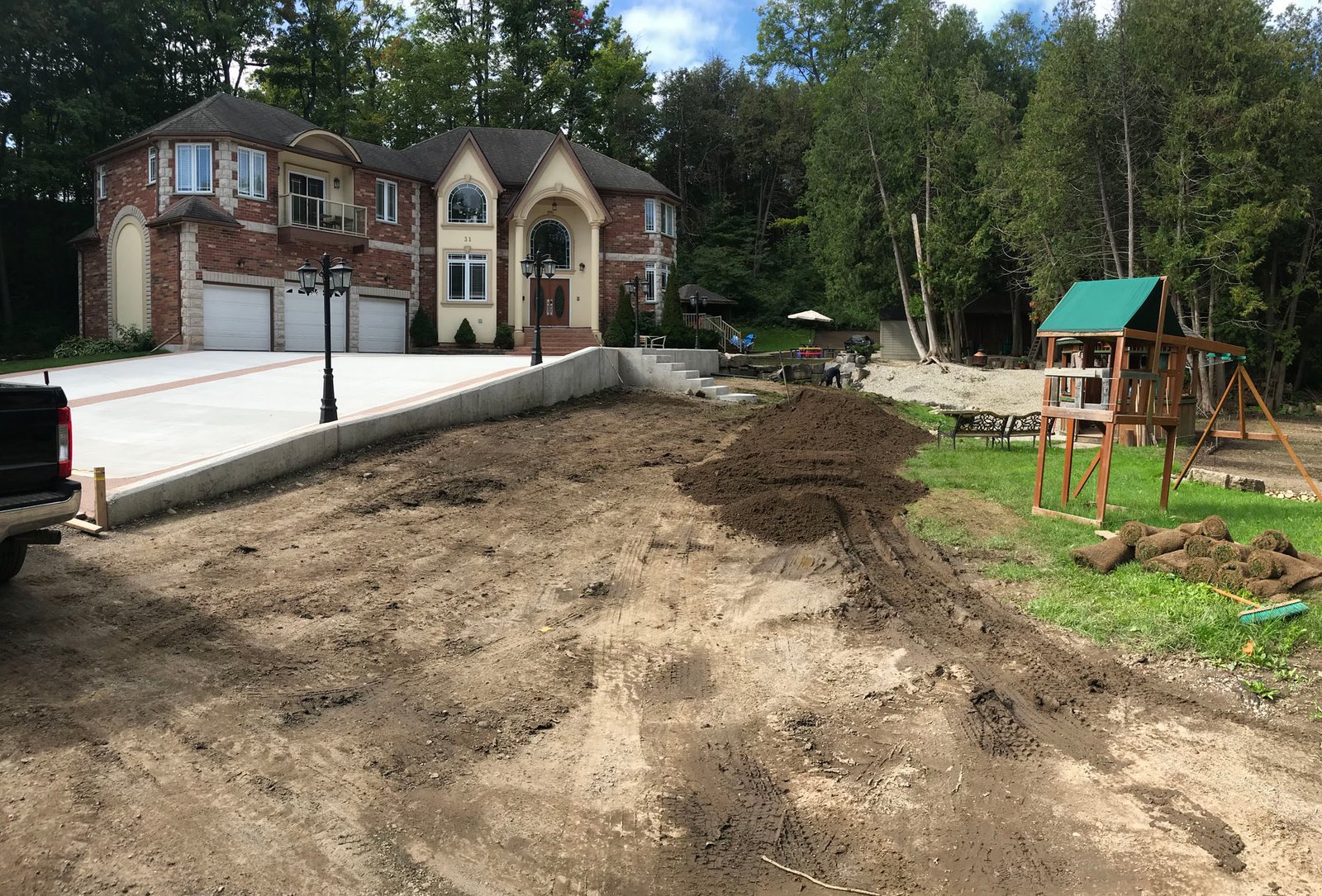 Sod Installation Bridgeport 6 Freshly laid rolls of sod on a residential lawn in Bridgeport, Kitchener.