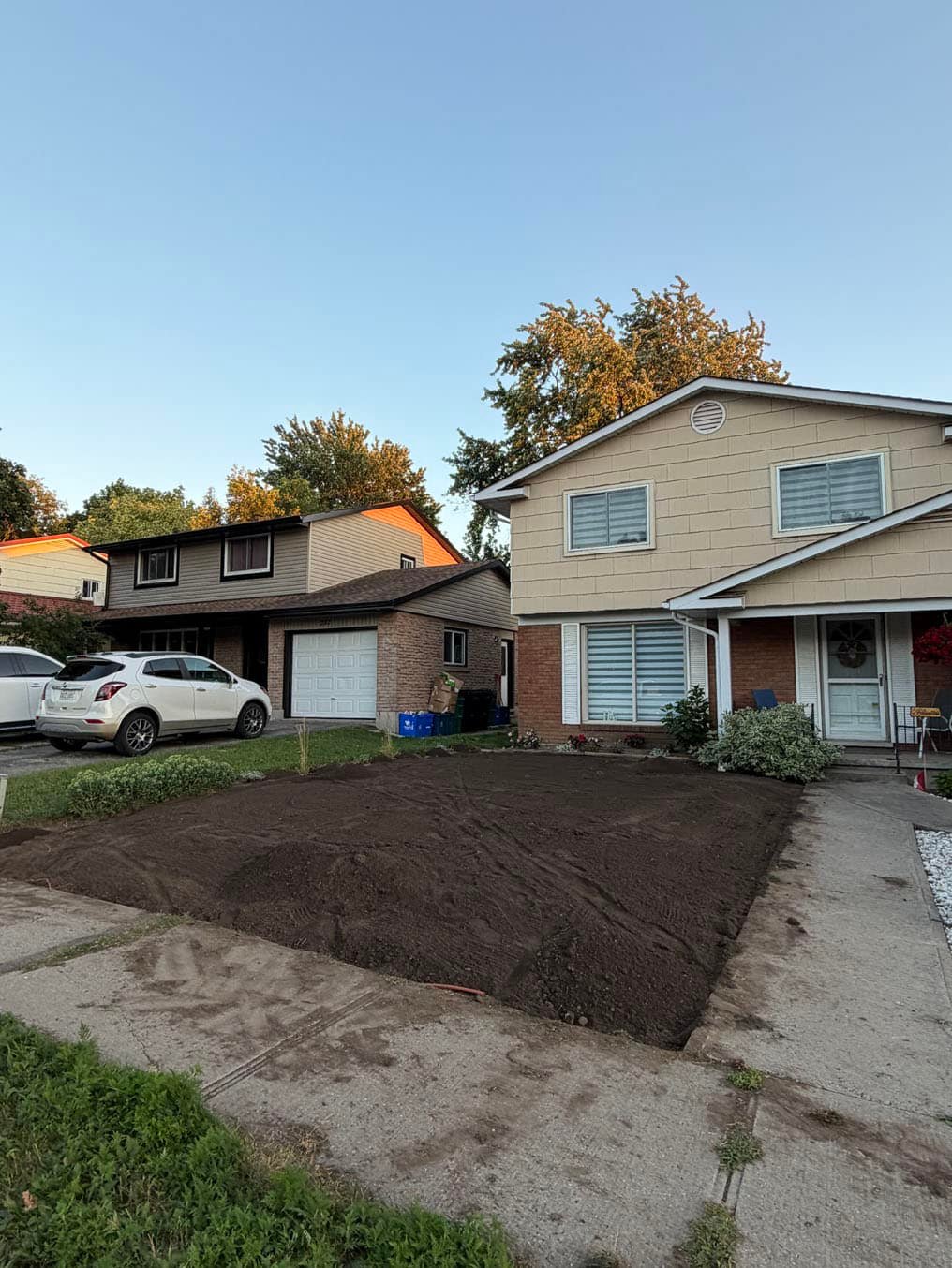 Sod Installation in Laurentian Hills, Kitchener 8 Front yard in Laurentian Hills, Kitchener stripped of old turf and graded with fresh topsoil, ready for sod