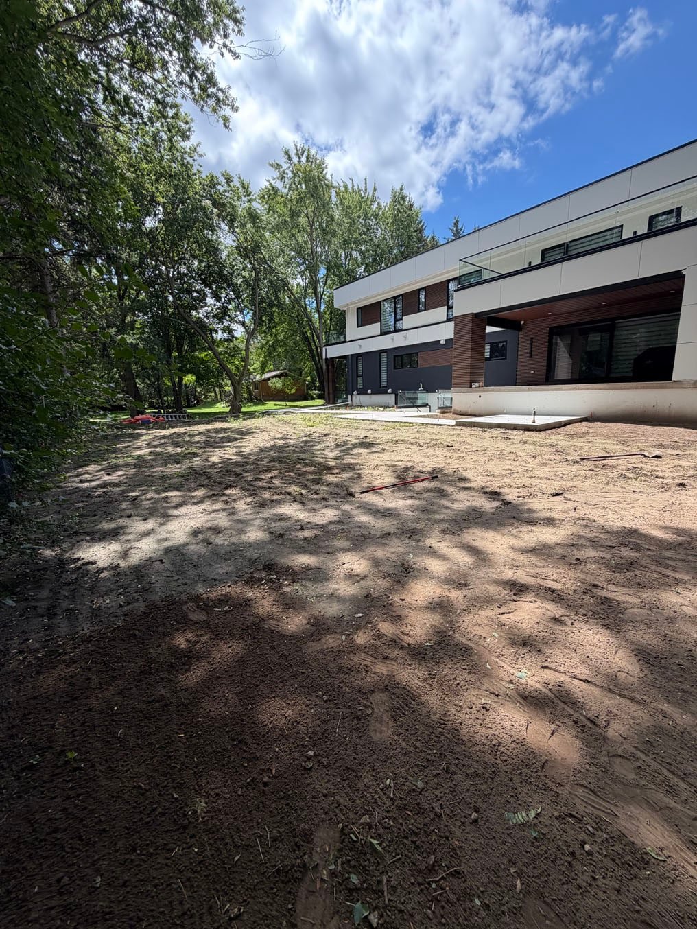 Sod Prices 4 Bare, compacted ground behind a newly built modern home on Lexington Crescent, Waterloo, before any topsoil or sod went down