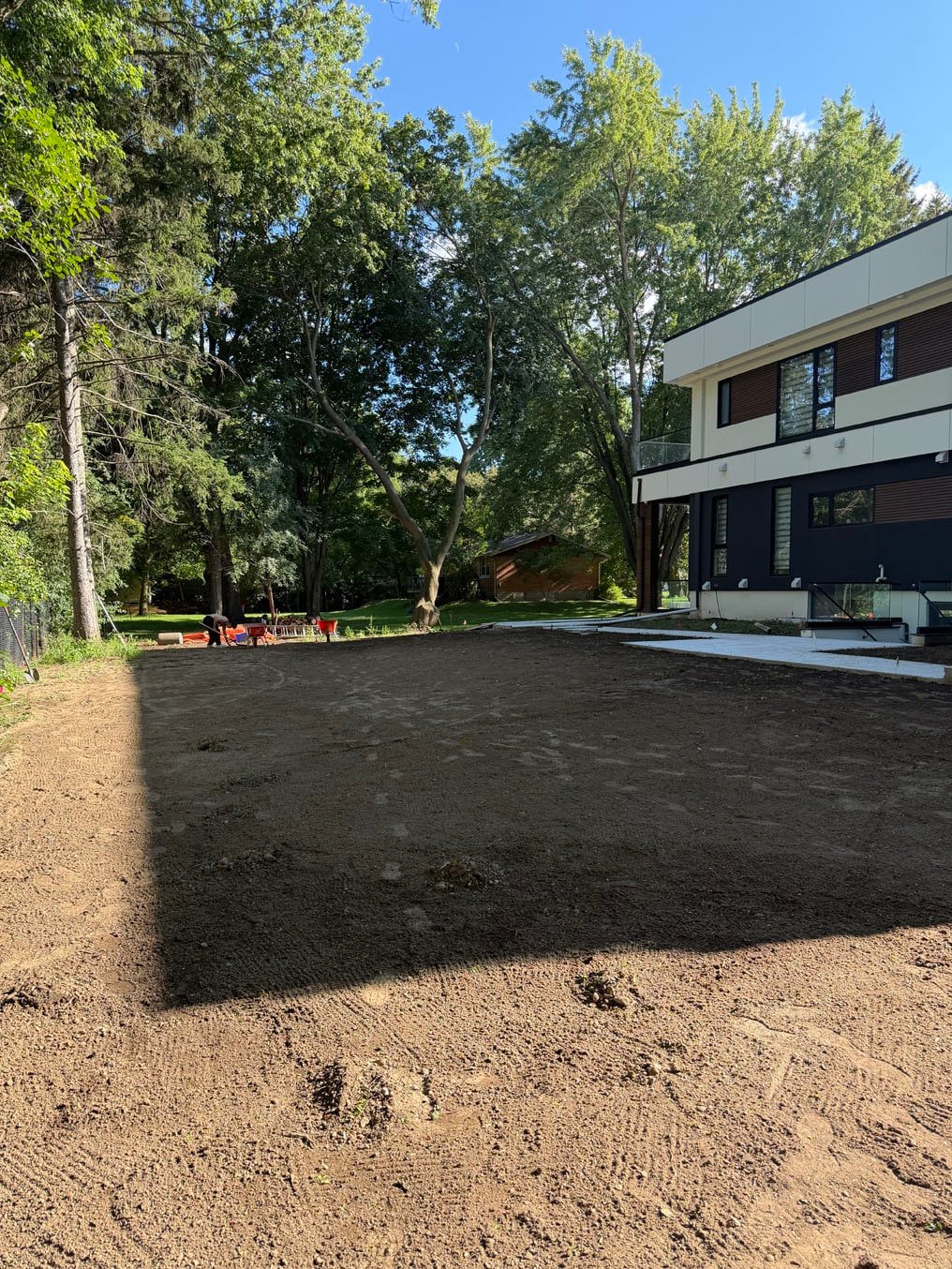 Sod Prices 5 Back yard on Lexington Crescent, Waterloo graded with fresh topsoil by the evening of 17 August, ready for sod