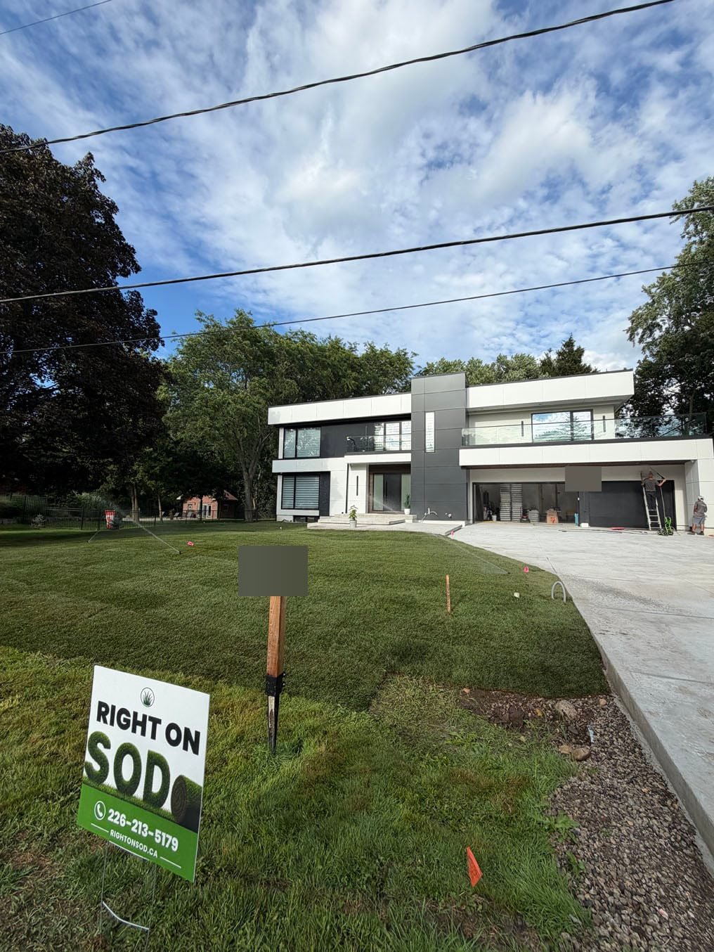 Sod Installation On Lexington Crescent, Waterloo 14 Front lawn laid on Lexington Crescent, Waterloo with sprinklers running and the Right On Sod sign on the evening of 18 August