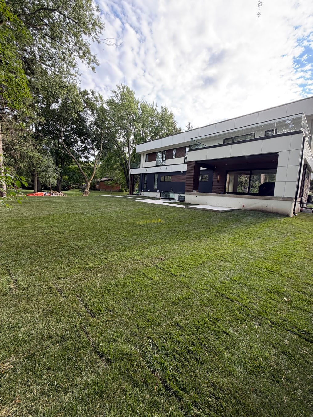 Sod Prices 8 New sod laid across the back lawn of a newly built home in Waterloo