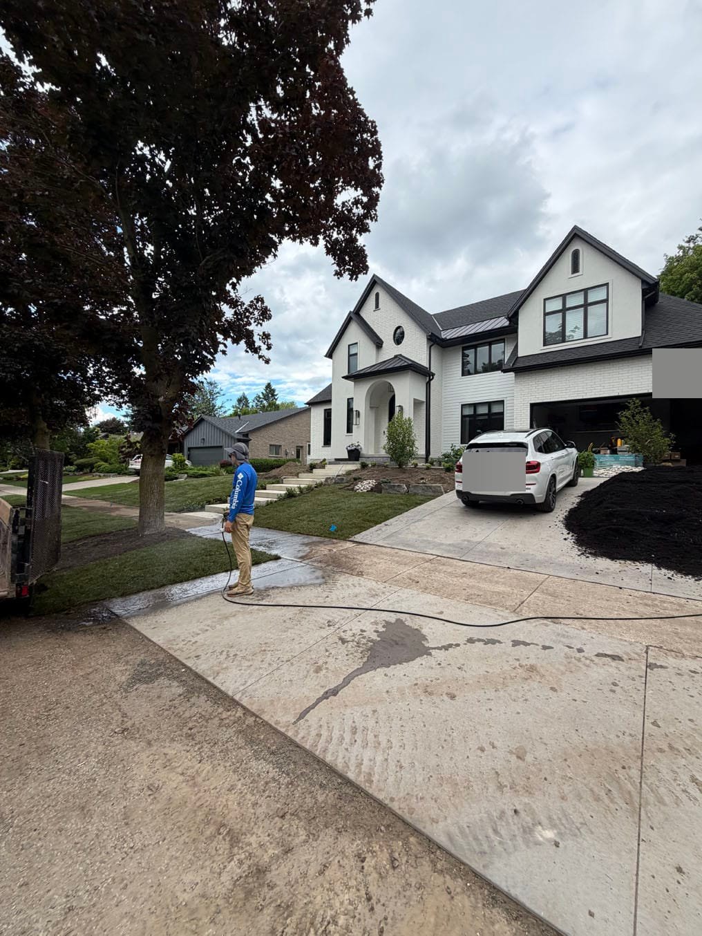 Front Lawn Sod Replacement In Westmount, Kitchener 4 New Kentucky bluegrass sod laid beside the steps and the driveway washed down at a Westmount, Kitchener home